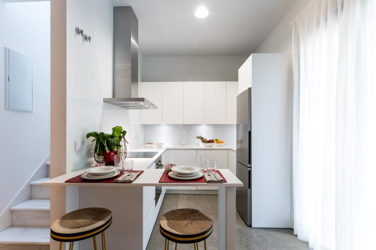 Apartamentos Rg Plaza De Espana Siviglia Esterno foto