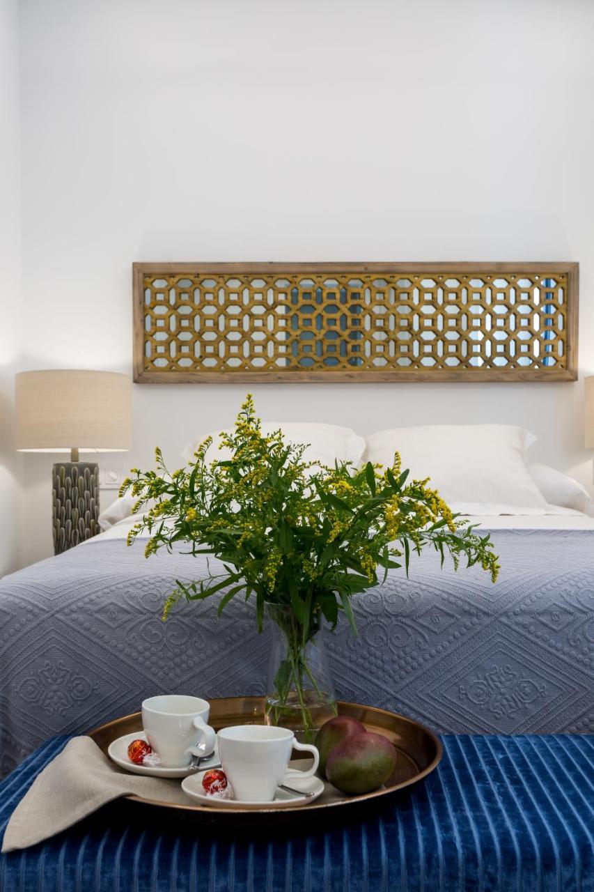 Apartamentos Rg Plaza De Espana Siviglia Esterno foto